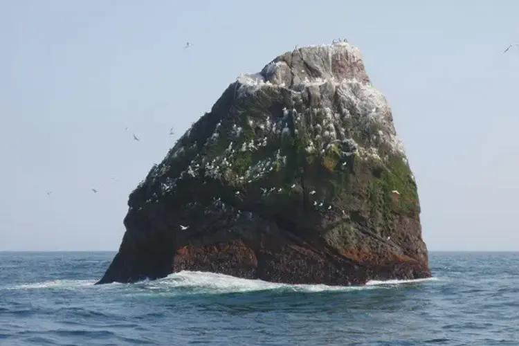The uninhabited island of Rockall, in the Atlantic from the Western Isles, incorporated as part of Scotland