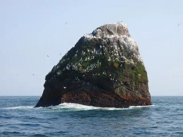 The uninhabited island of Rockall, in the Atlantic from the Western Isles, incorporated as part of Scotland