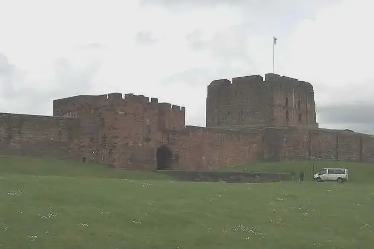 Bonnie Prince Charlie, accompanied by bagpipers, enters Carlisle Castle after their surrender